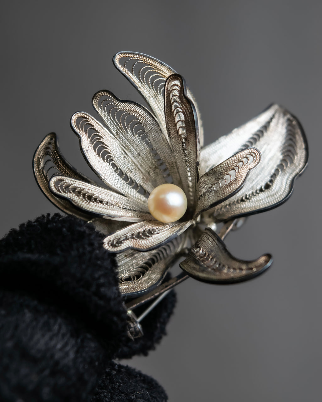 "Vintage petal motif broach"