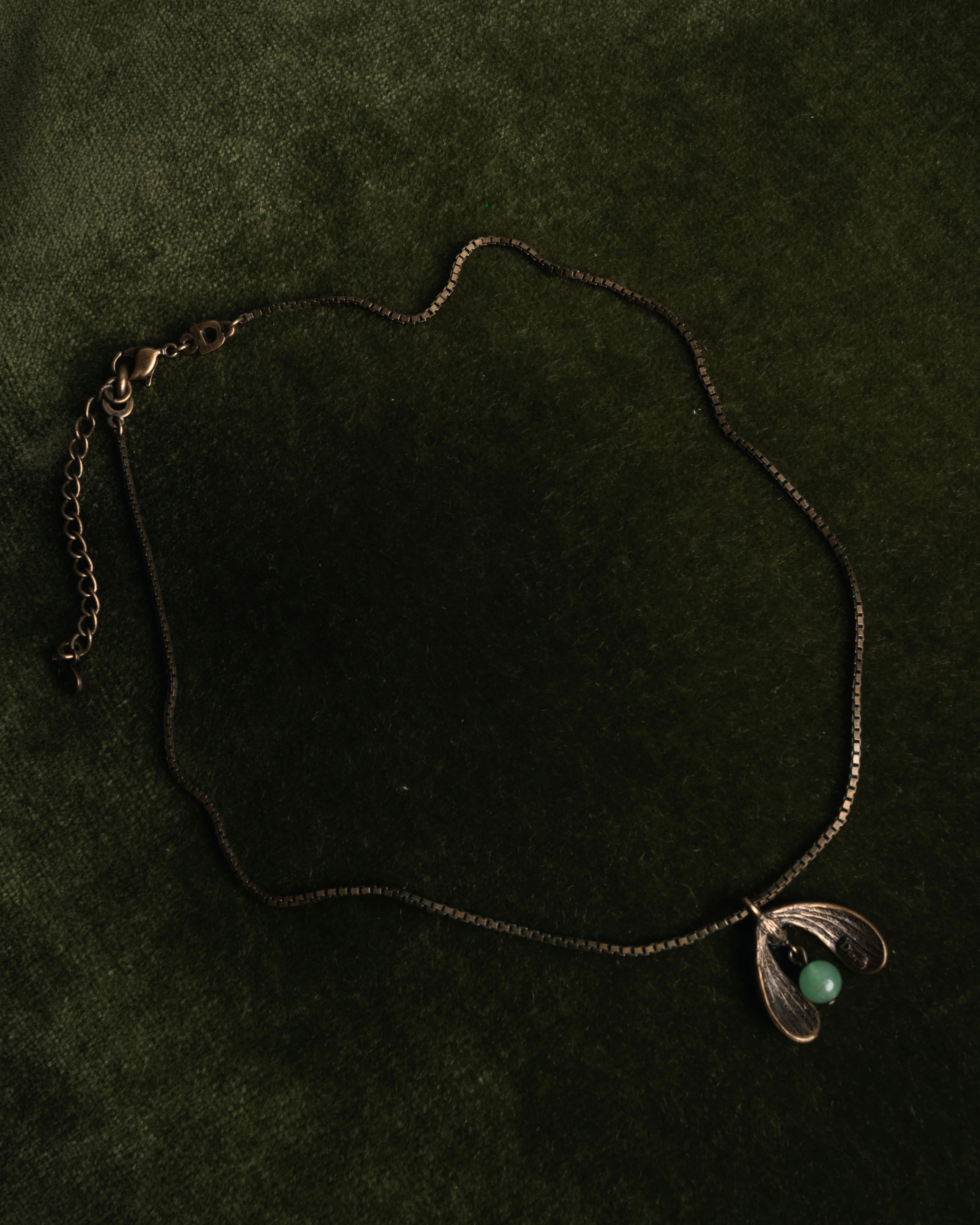 “Christian Dior” 90’s-00’s Antique gold botanical pendant necklace