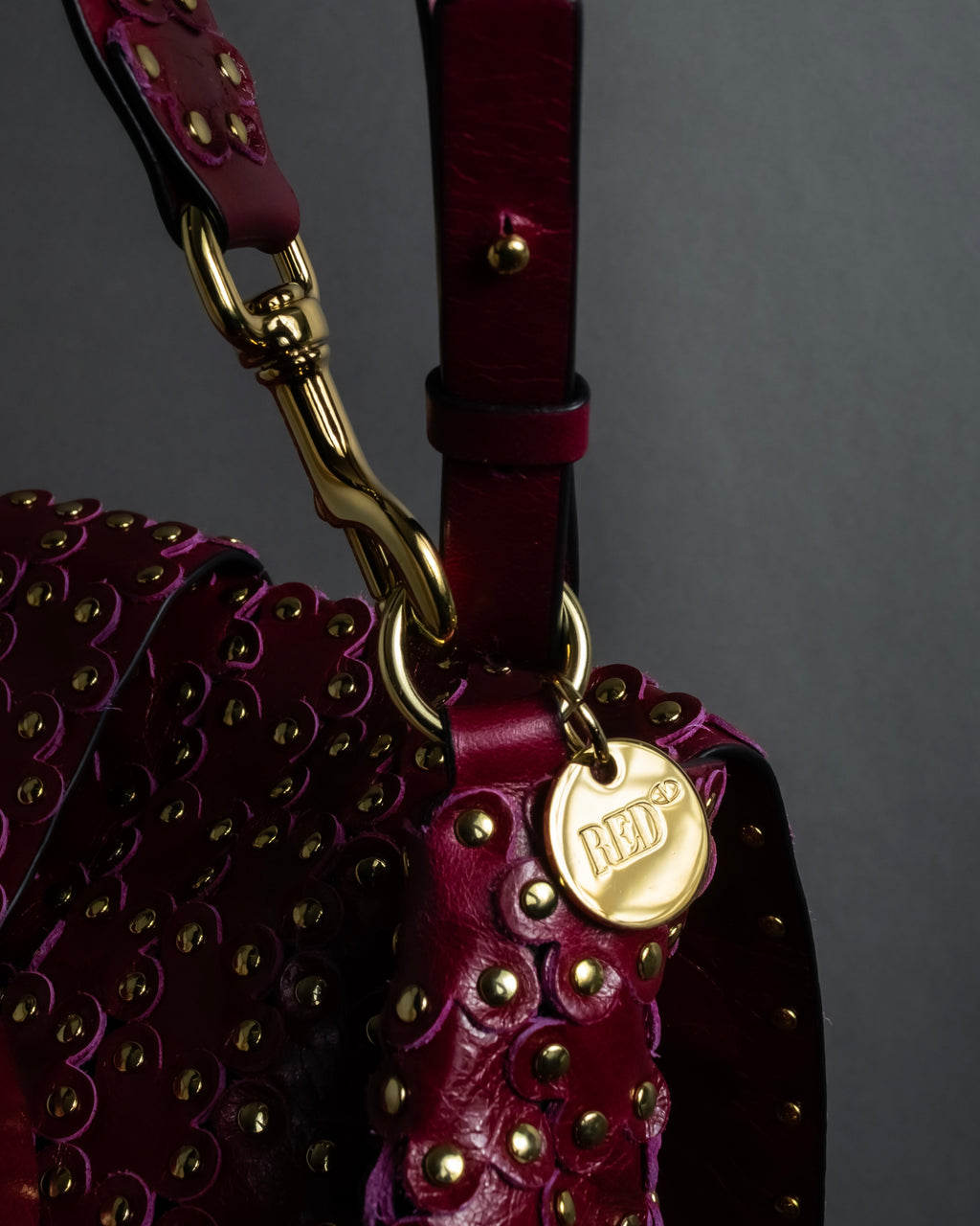 "RED VALENTINO" Flower puzzle motif stud design leather bag