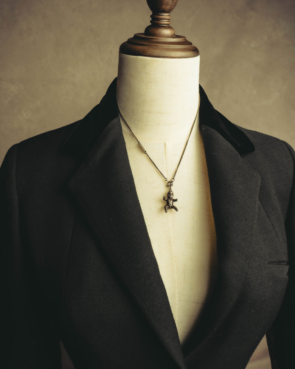 "Saint Laurent" 10's-20's Sculptural doll pendant necklace