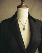 "Saint Laurent" 10's-20's Sculptural doll pendant necklace