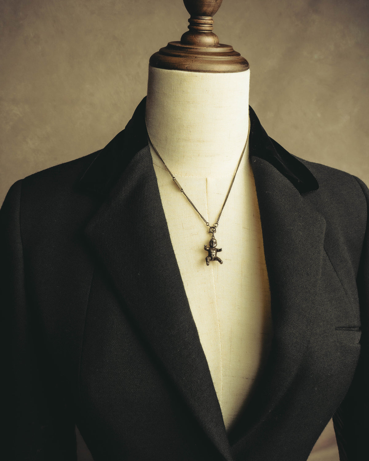 "Saint Laurent" 10's-20's Sculptural doll pendant necklace