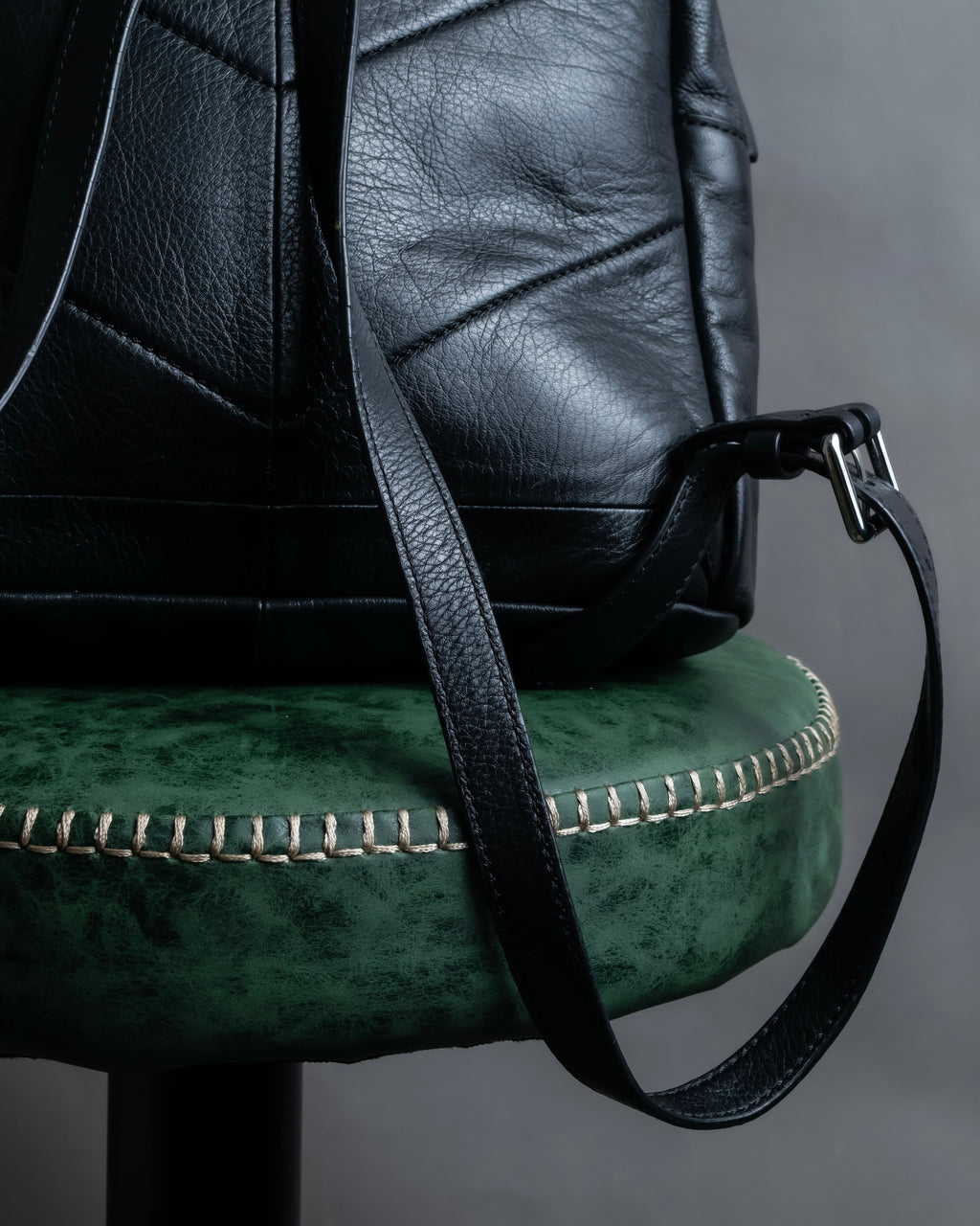 "DIESEL" Decorative zip design leather backpack