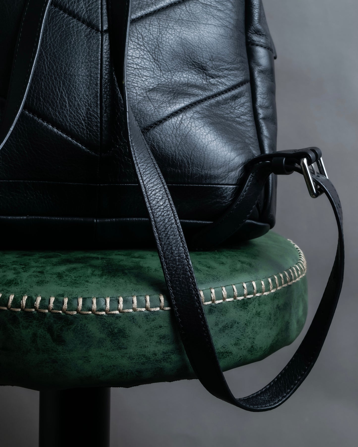 "DIESEL" Decorative zip design leather backpack