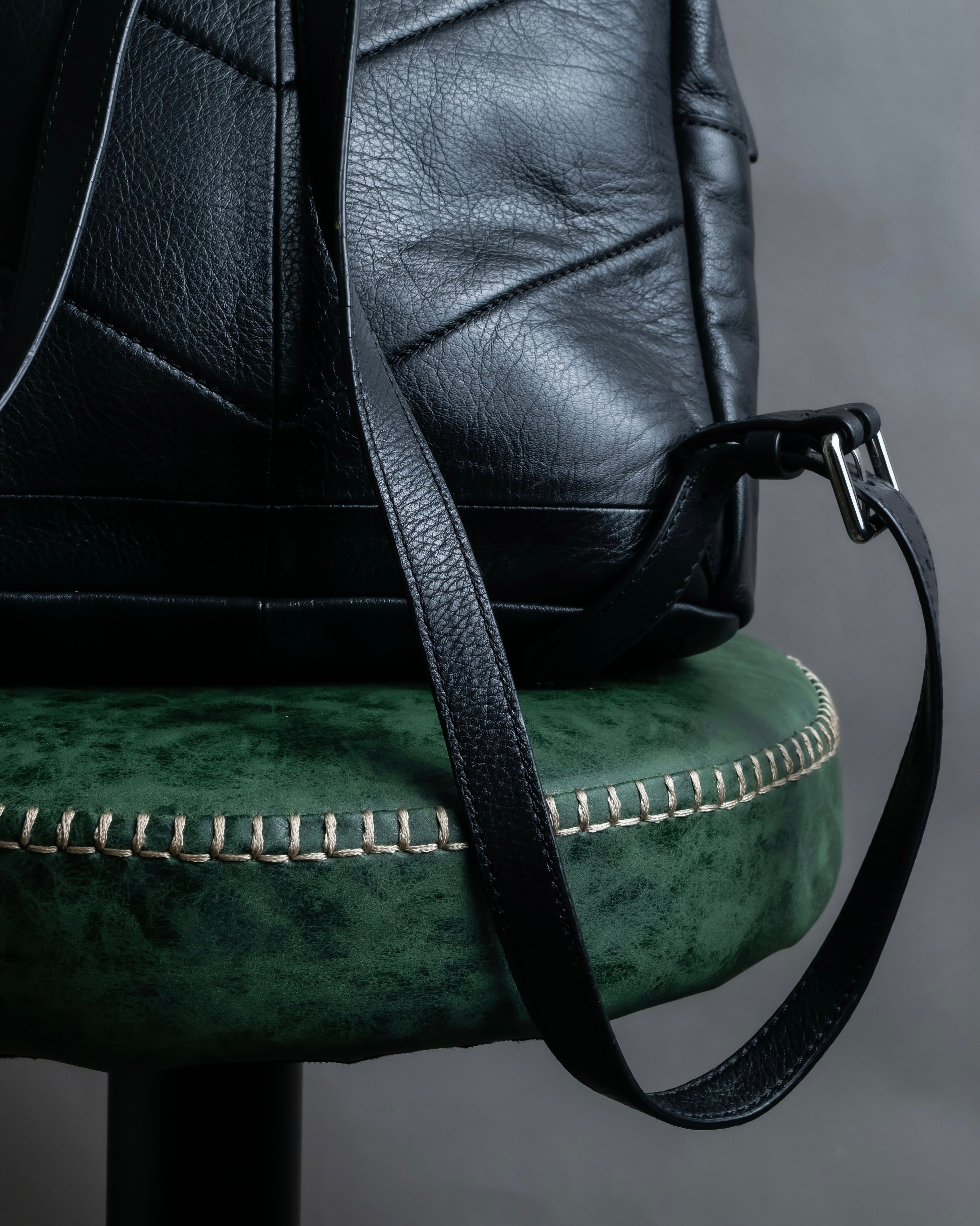 "DIESEL" Decorative zip design leather backpack
