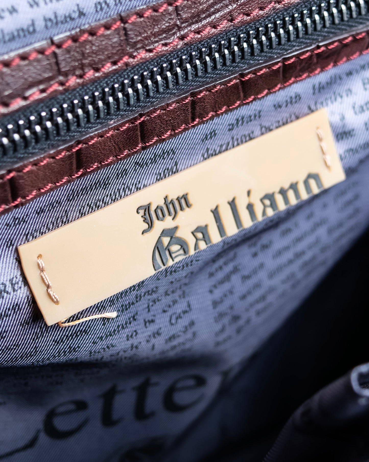 "John Galliano" Trapezoid design clasp different leather hand bag