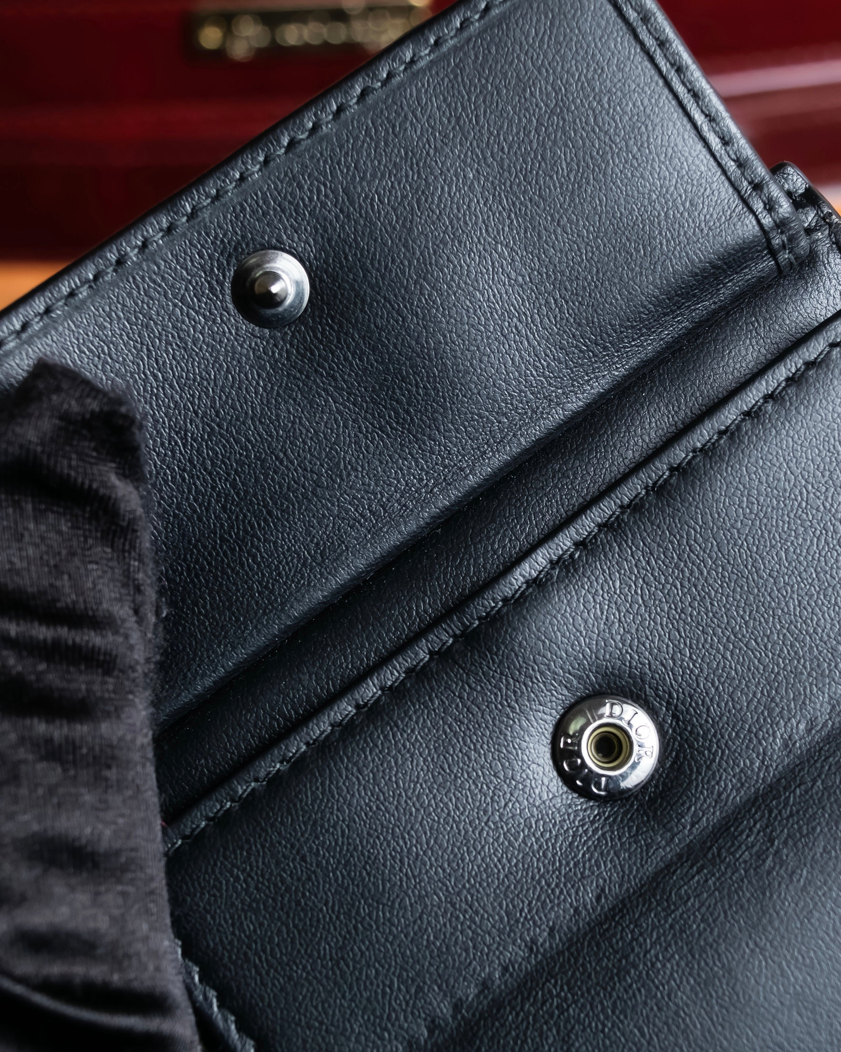 "Dior" Logo engraved bi-fold leather wallet