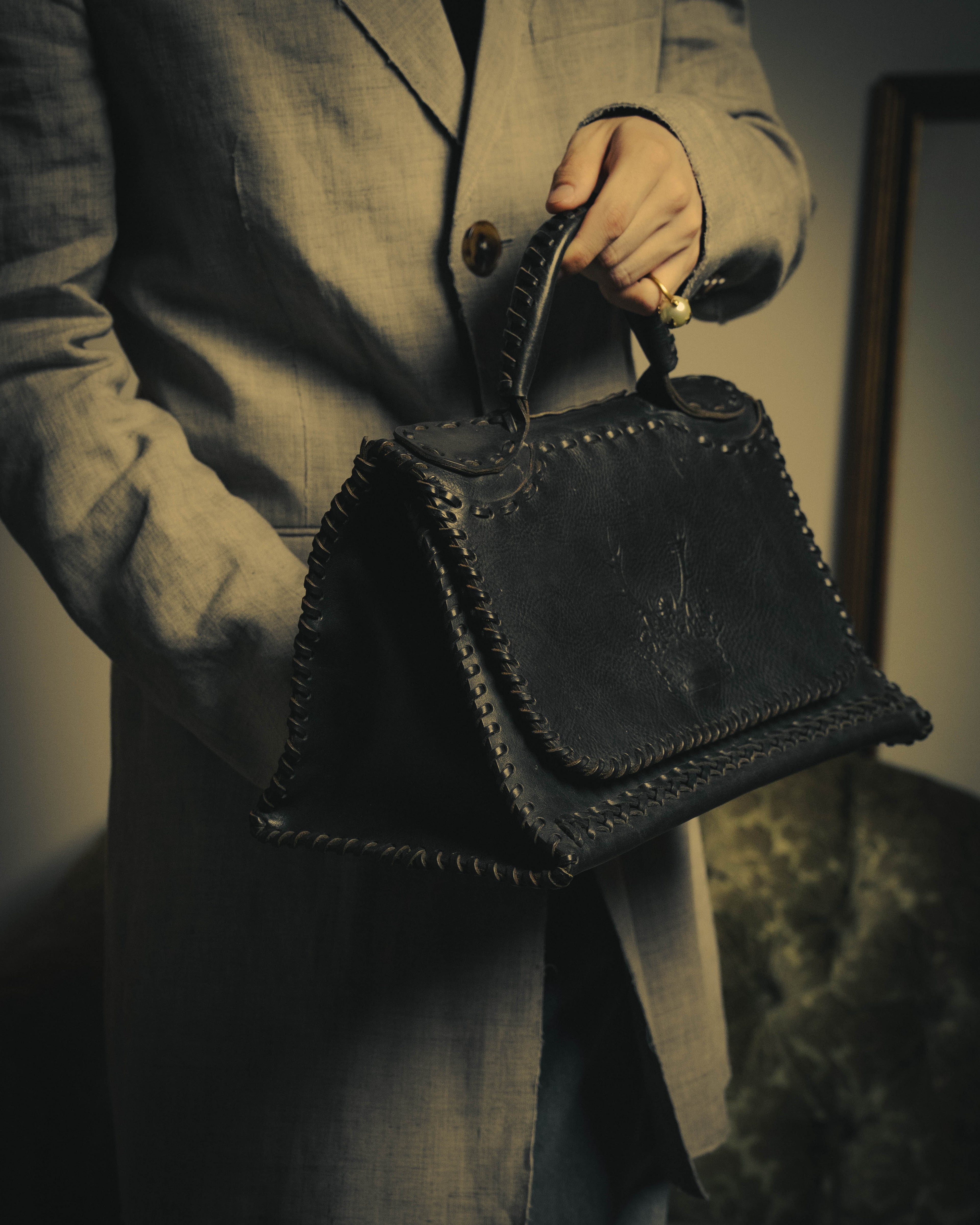 -SPECIAL- “FENDI” 80’s-90’s Coat of arms embossed whipstitched leather handbag