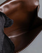 "PRADA" Logo engraved canvas＆leather combination short wallet