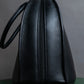 "MORABITO" Half moon design grained leather handbag