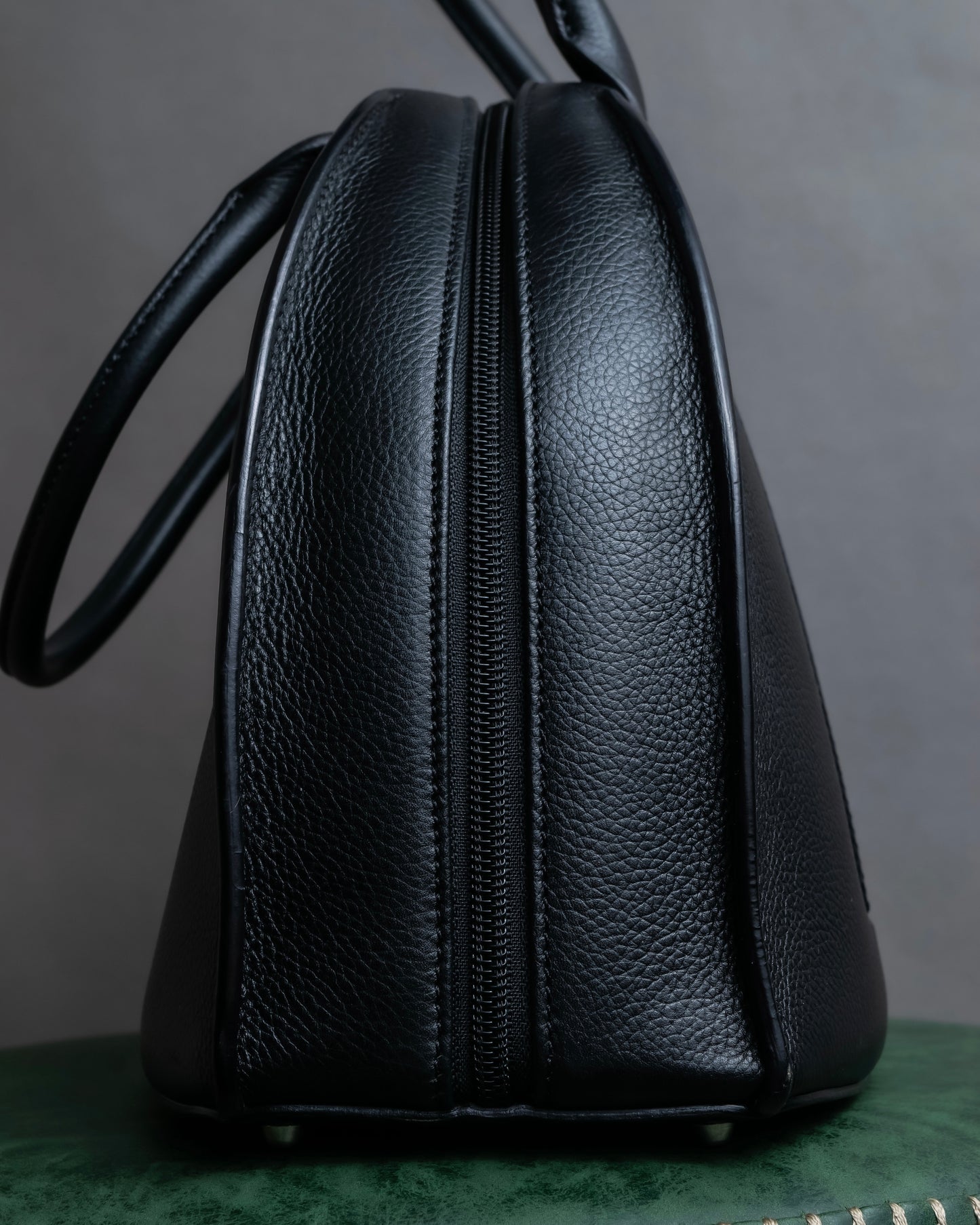 "MORABITO" Half moon design grained leather handbag