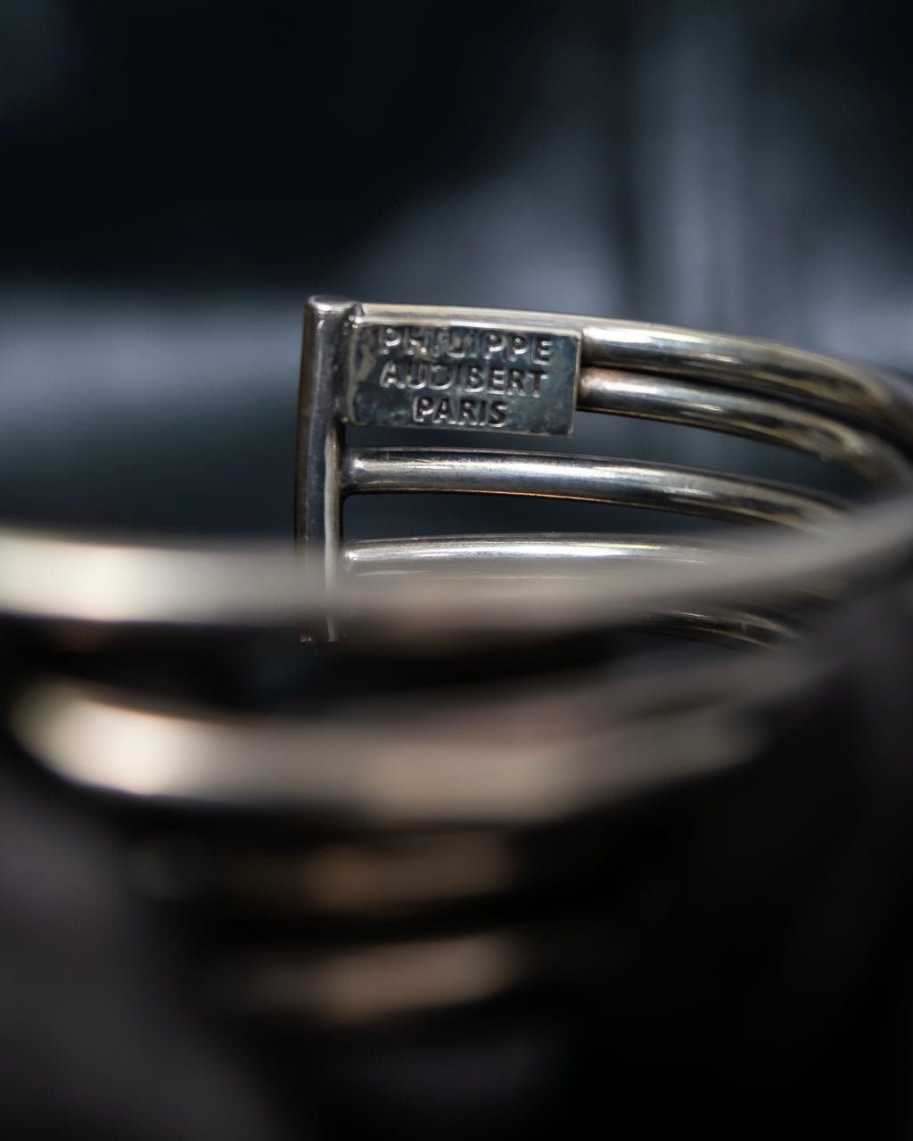 “PHILIPPE AUDIBERT” Crossed 5 line silver bangle