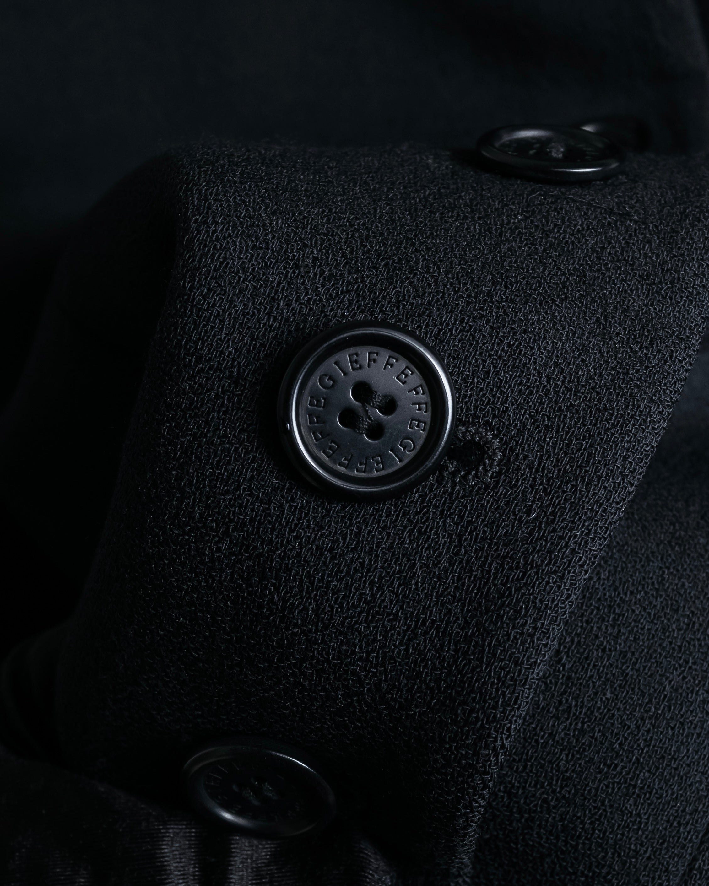 "GIANFRANCO FERRE" Multiple button sequences shaped long coat