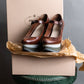 "PRADA" Brown leather stepped sole wedge heel pumps