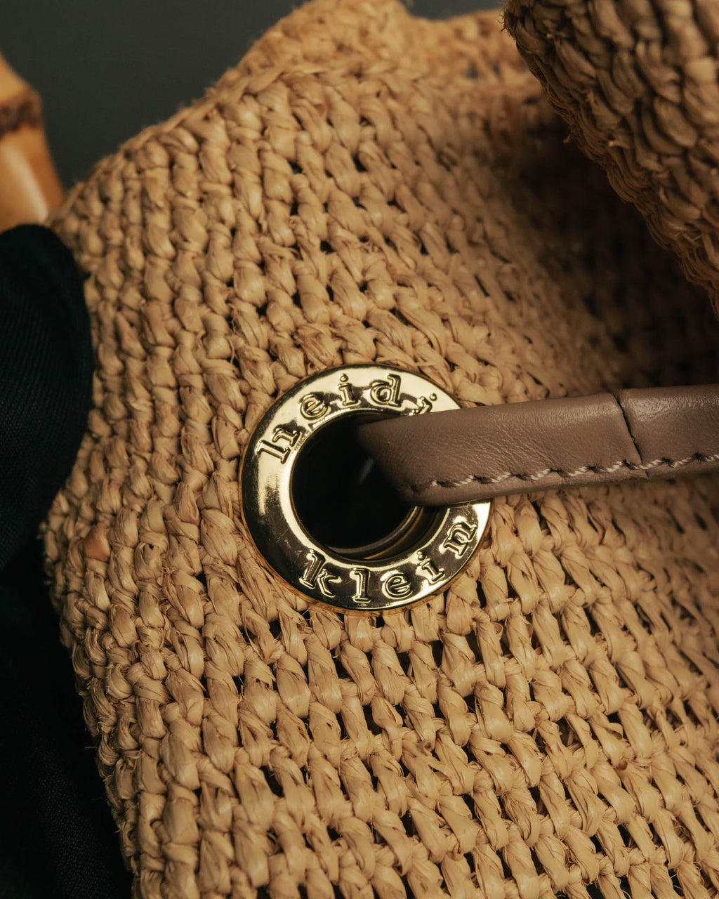 “Heidi Klein” Natural raffia bamboo handle bucket bag