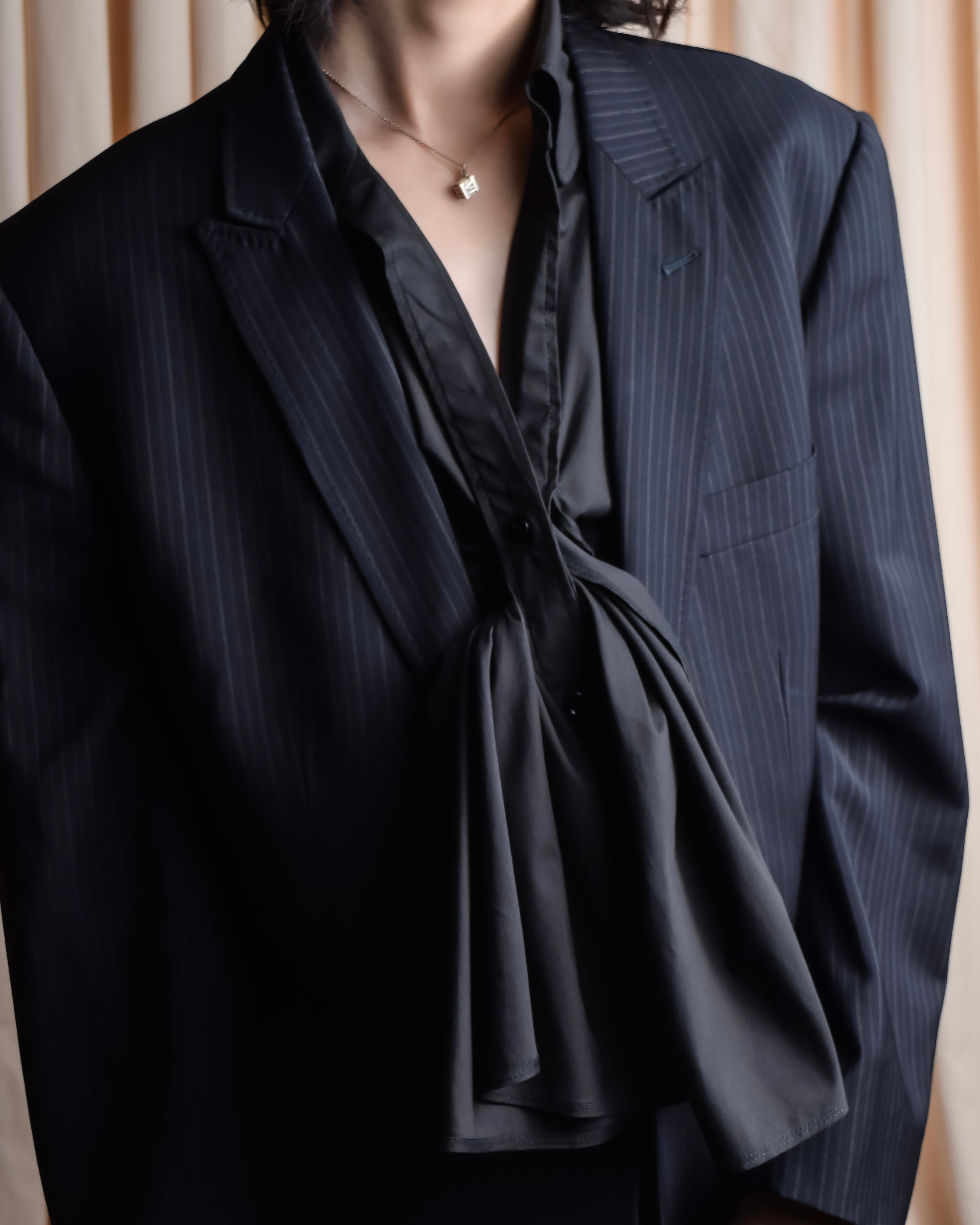 "Yves Saint Laurent Rive Gauche"
Twisted front sleeveless shirt