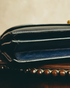 -SPECIAL- “HERMÈS” 50’s-60’s sculptural oval clasp midnight navy leather handbag