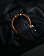 “Salvatore Ferragamo” 90’s-00’s wicker gancini leather handbag