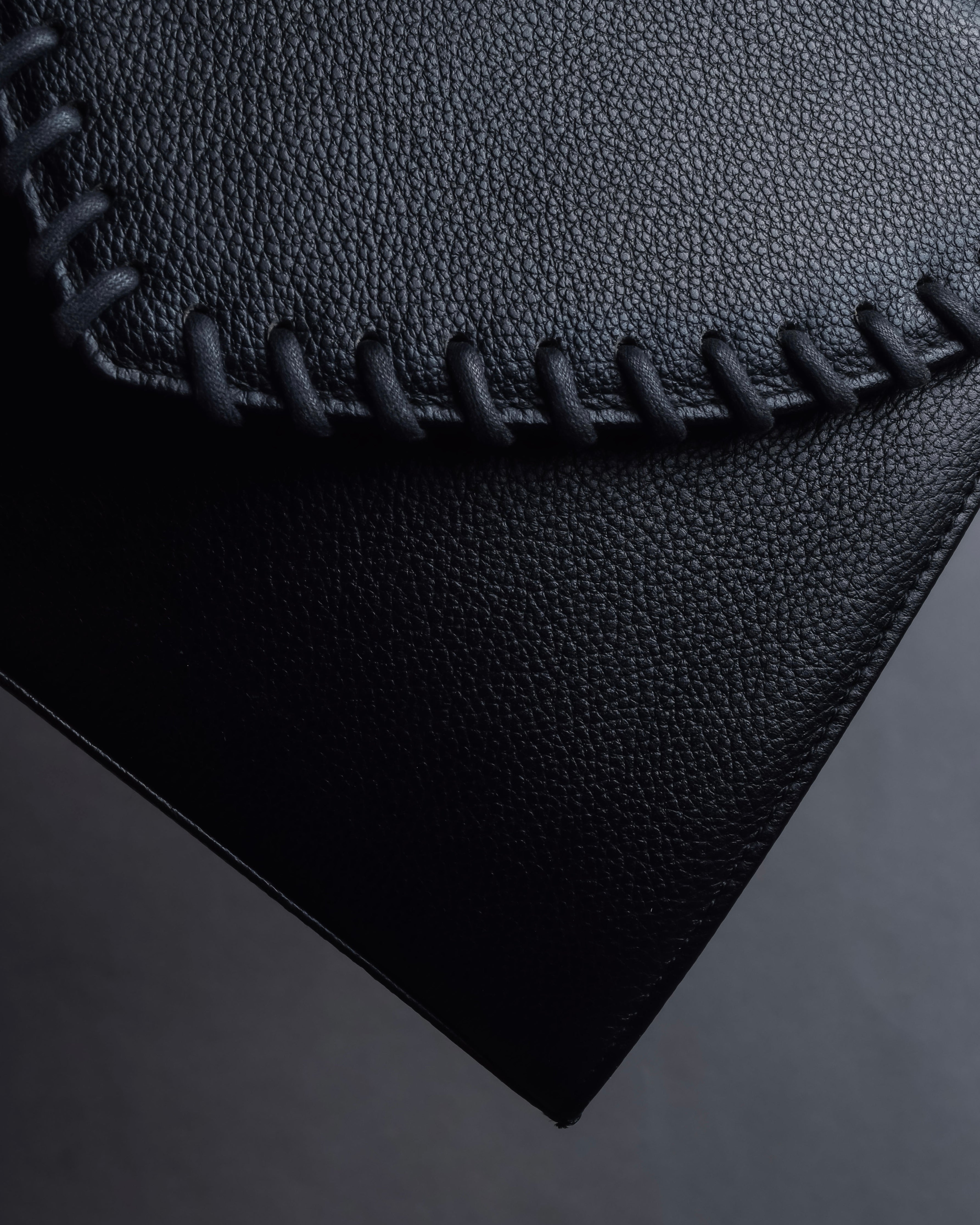 "YVES SAINT LAURENT" Hand stitched design trapezoid leather bag