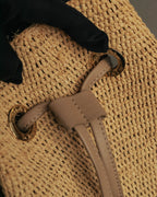 “Heidi Klein” Natural raffia bamboo handle bucket bag