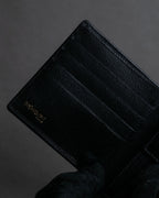 "YVES SAINT LAURENT" Cassandra logo engraved leather bi-fold wallet