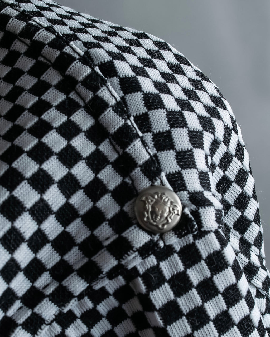 “VERSACE” checkered pattern zip pocket pull over