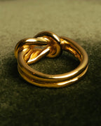"HERMES" Sculptural gold tone knot Atame scarf ring