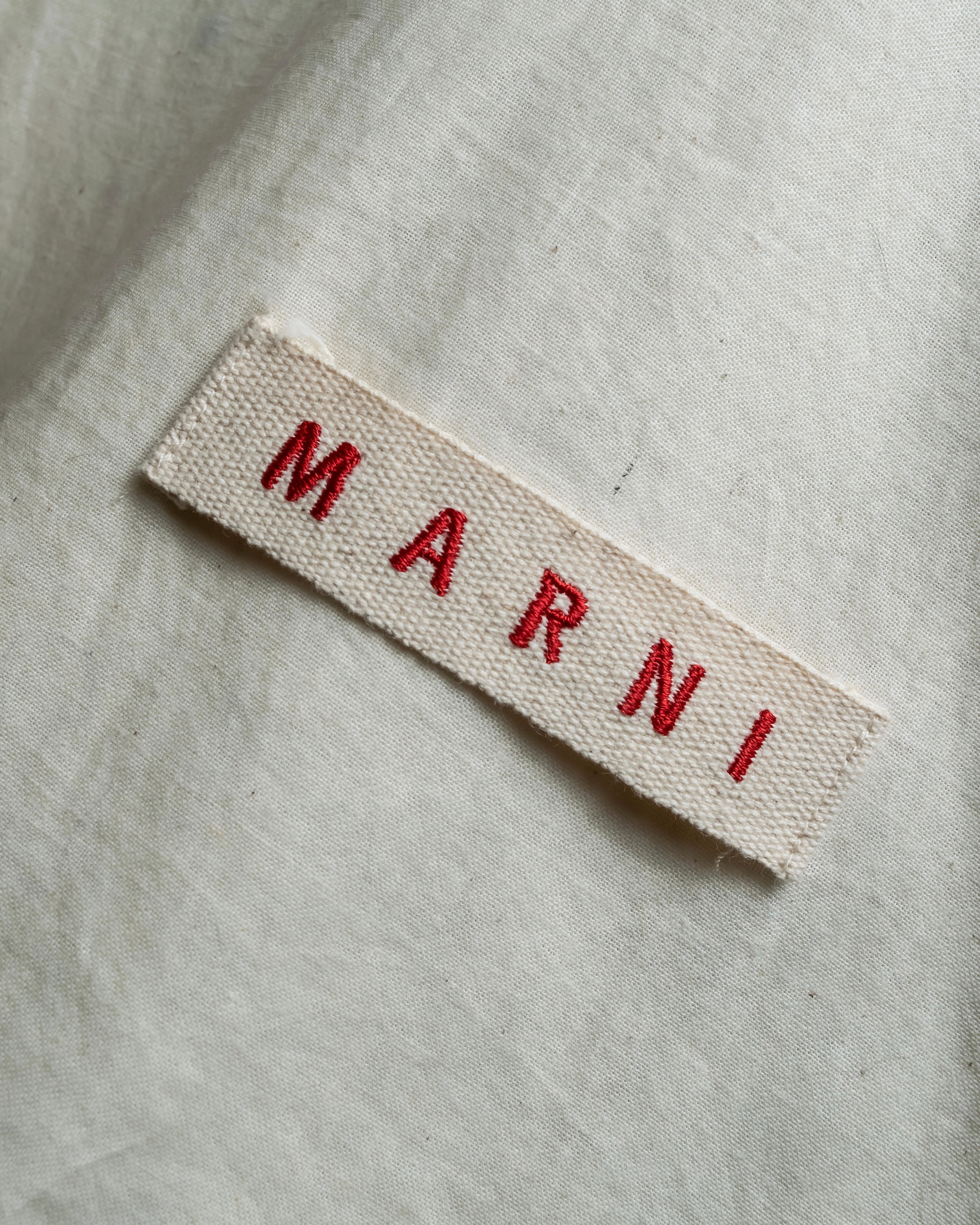 "MARNI" Side ribbon design rounded body leather bag