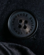 "JOHN LAWRENCE SULLIVAN"
 Large lapel double-breasted mid length coat