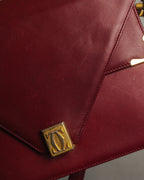 “Cartier” 80’s-90’s Must de Cartier burgundy leather shoulder bag
