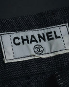 "CHANEL" high-waisted pleated trousers with signature gold button