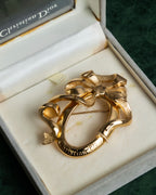 "Christian Dior" Oval ribbon motif gold brooch