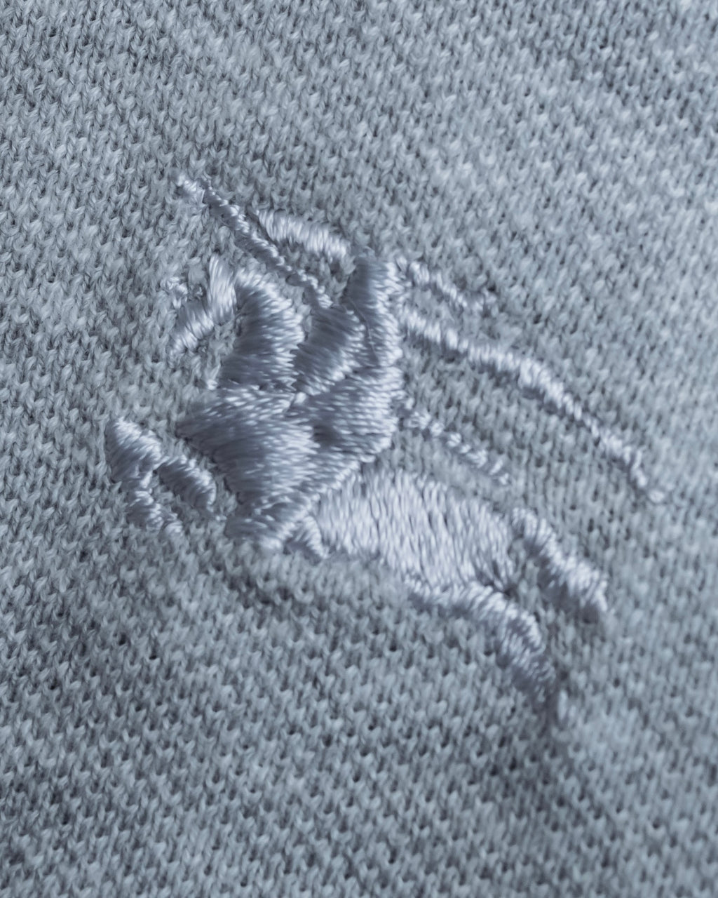 "BURBERRY" Knight logo engraved metal button polo shirt