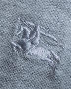 "BURBERRY" Knight logo engraved metal button polo shirt