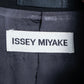 “ISSEY MIYAKE”  Chin belt designed stand collar jacket