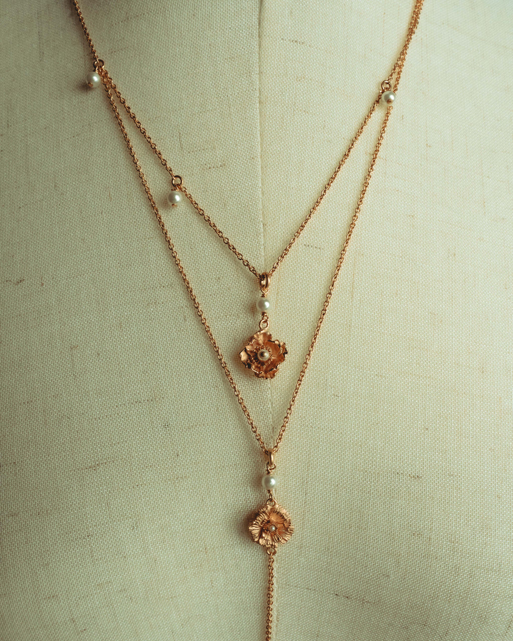 “Christian Dior” 2019-2025 Gold floral charm necklace with pearl accents