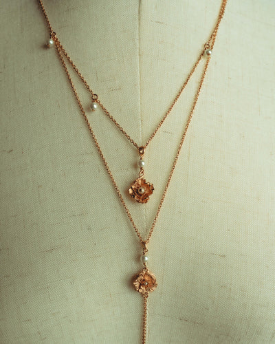 “Christian Dior” 2019-2025 Gold floral charm necklace with pearl accents