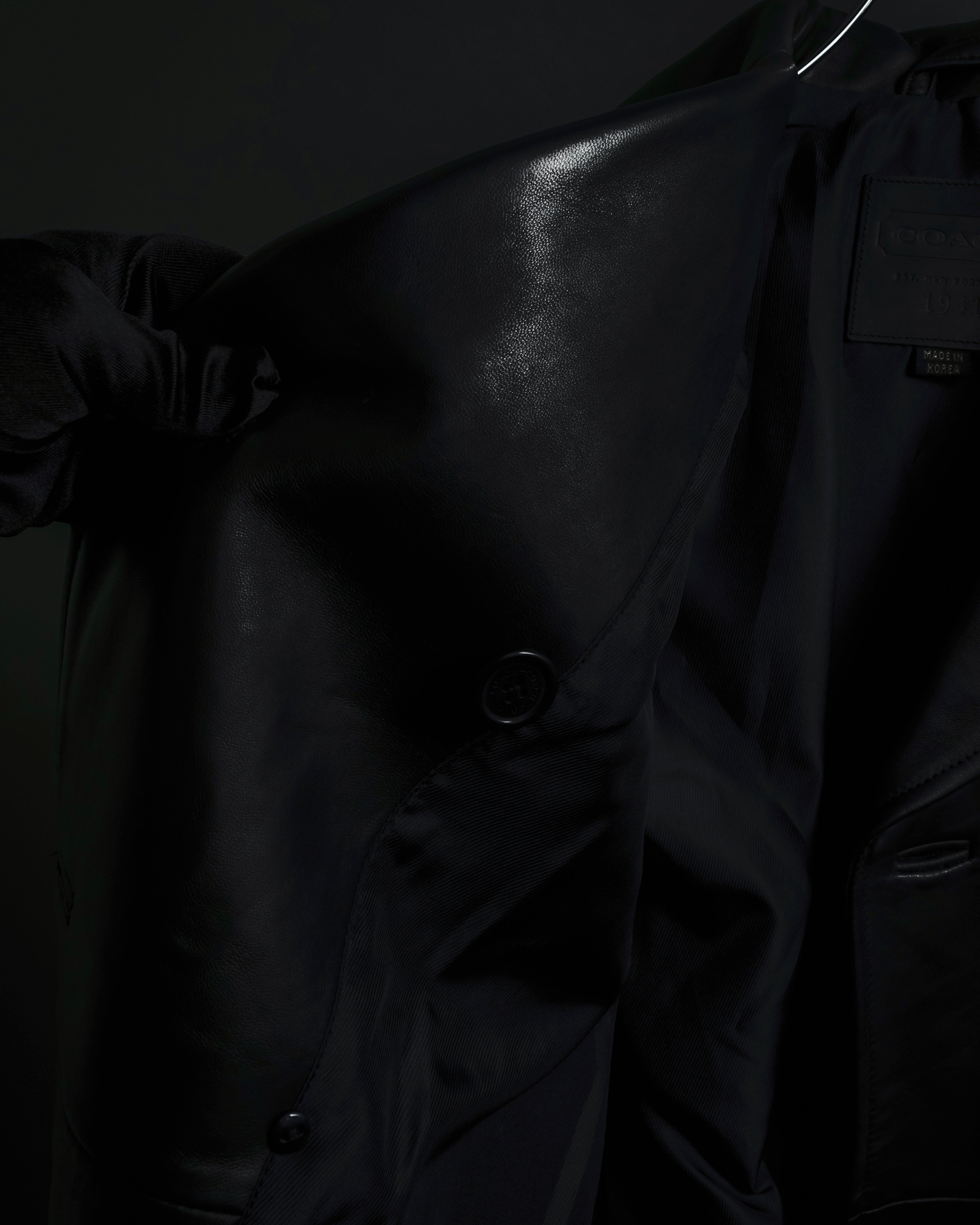 "COACH" Double-breasted panel work design leather coat