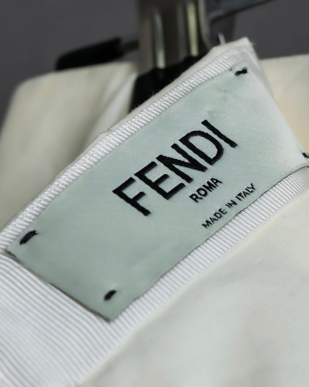 "FENDI" hole pattern and tack designed skirt