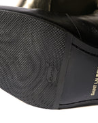 アウトソール前足部に施されたVibramソールの裏張りと、ソール裏に入る「SAINT LAURENT PARIS」刻印を捉えたディテールカット。