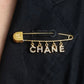 "CHANEL" Logo motif gold safety pin brooch