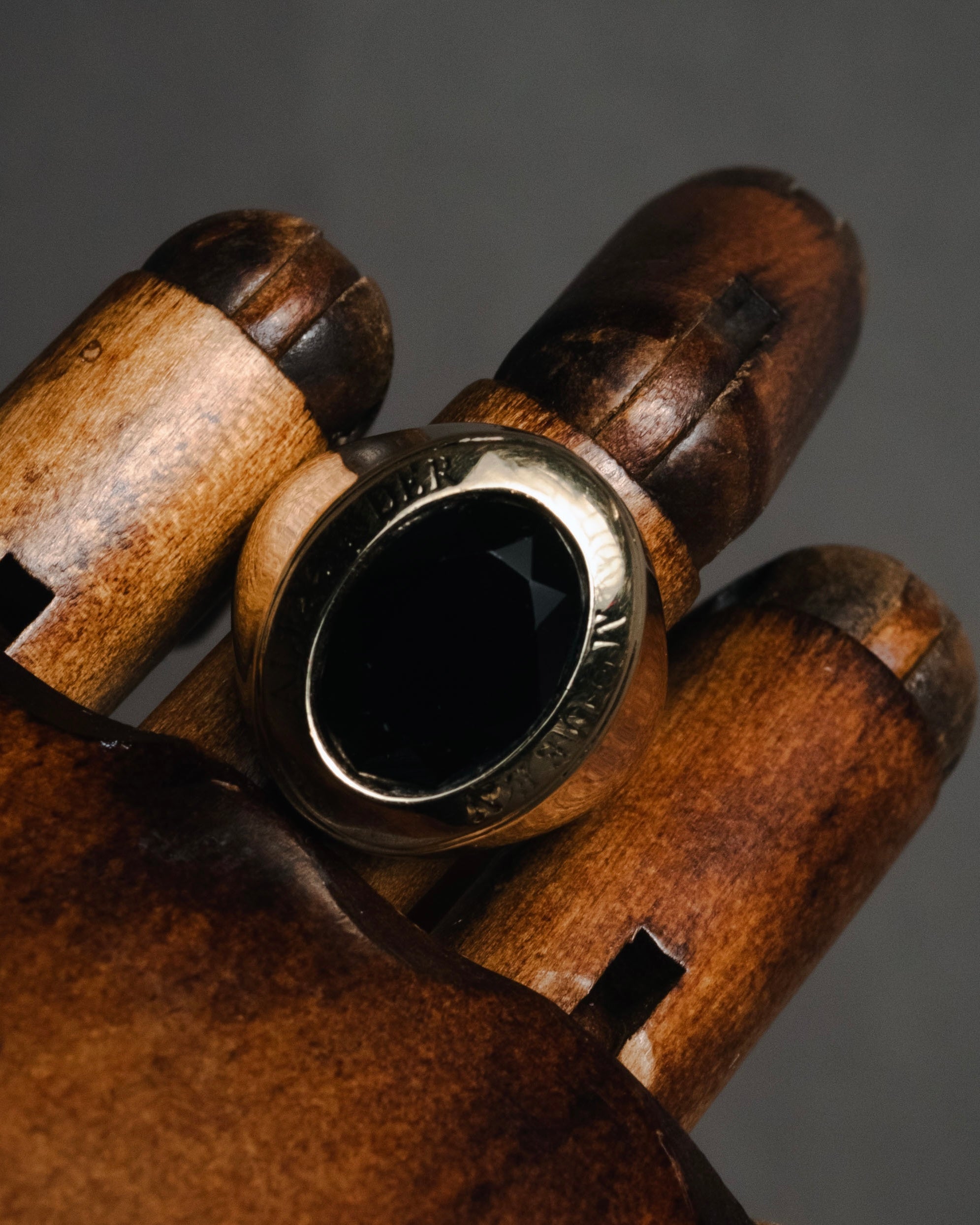 "Alexander McQueen" 10’s black stone signet ring