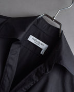 "Yves Saint Laurent Rive Gauche"
Twisted front sleeveless shirt