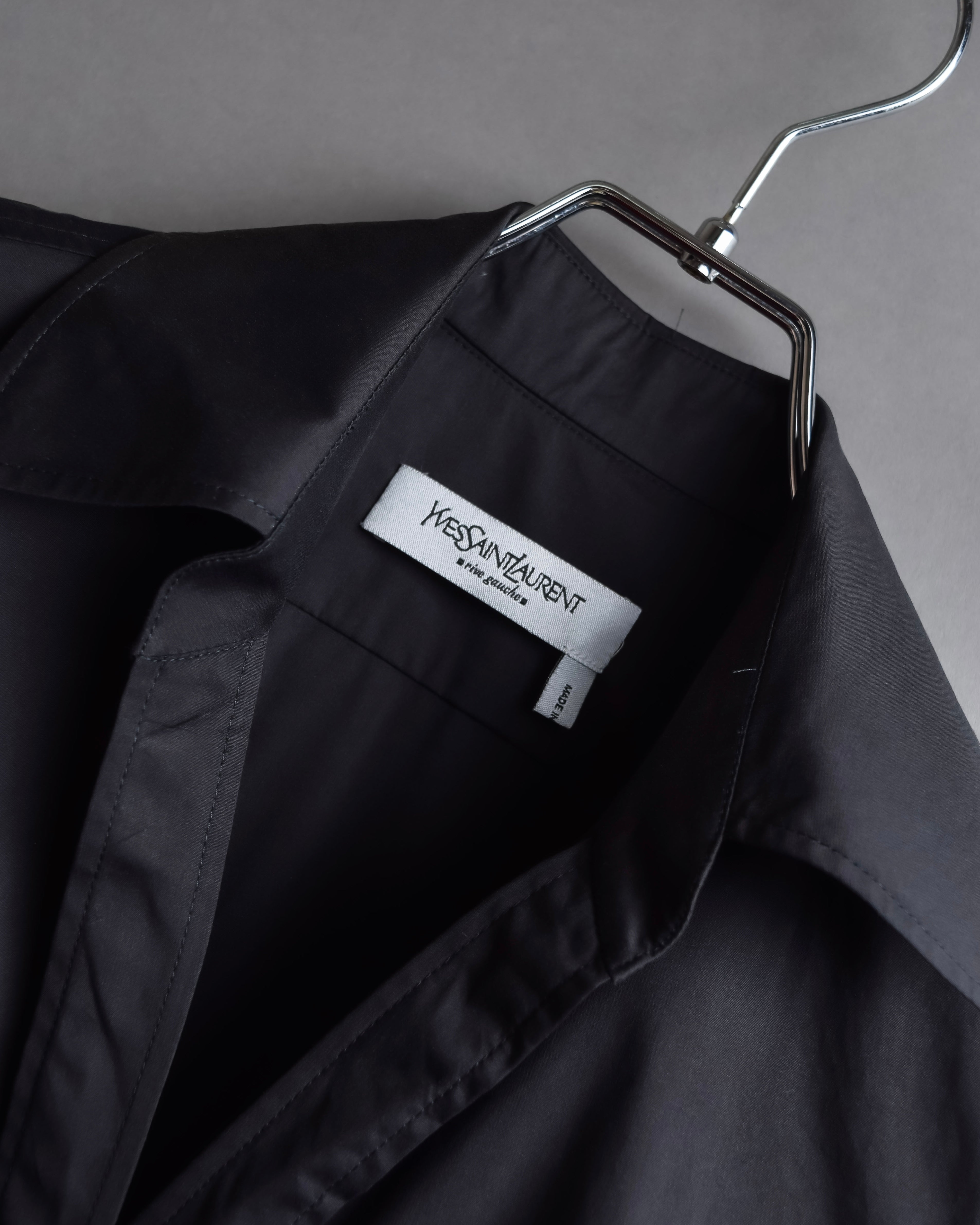 "Yves Saint Laurent Rive Gauche"
Twisted front sleeveless shirt