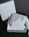"MAISON MARGIELA" White grain leather round zipper wallet