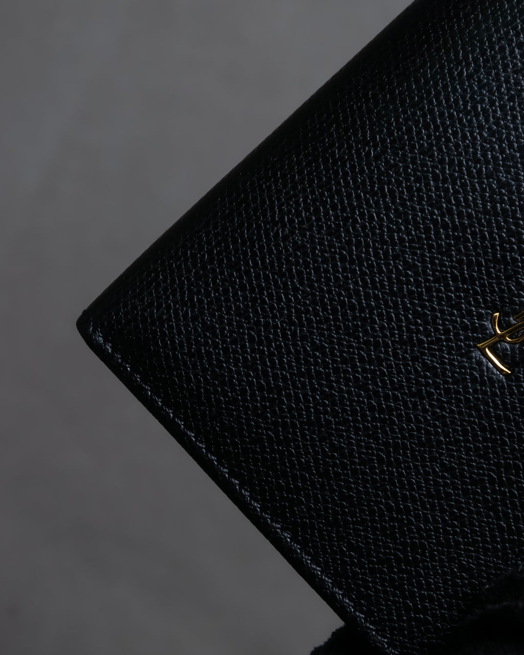 "YVES SAINT LAURENT" Cassandra logo engraved leather bi-fold wallet