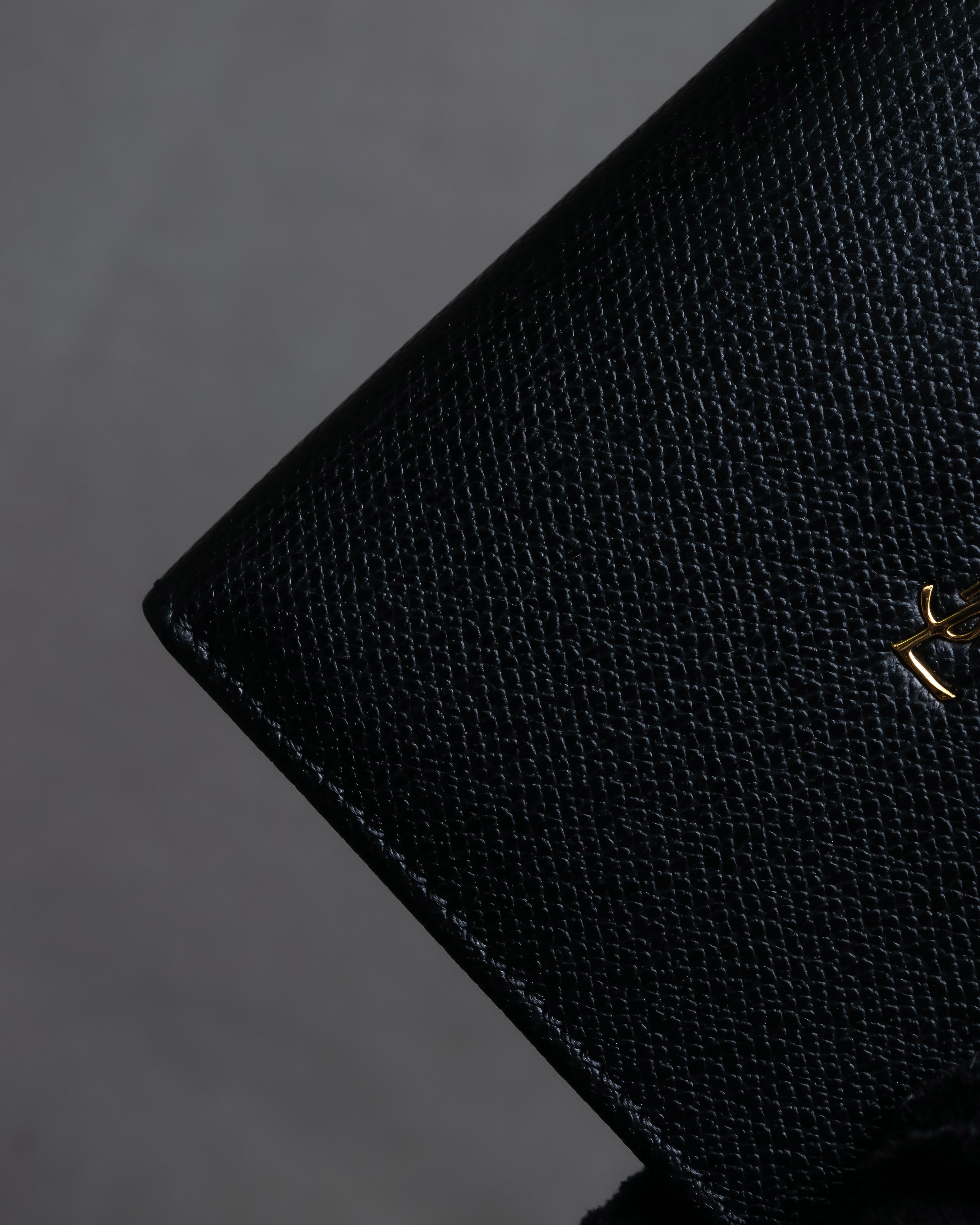 "YVES SAINT LAURENT" Cassandra logo engraved leather bi-fold wallet