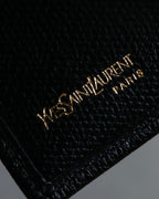 "YVES SAINT LAURENT" Cassandra logo engraved leather bi-fold wallet