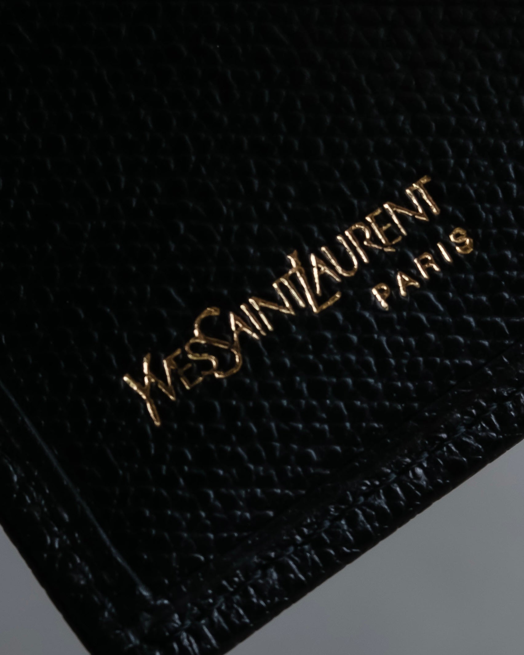"YVES SAINT LAURENT" Cassandra logo engraved leather bi-fold wallet