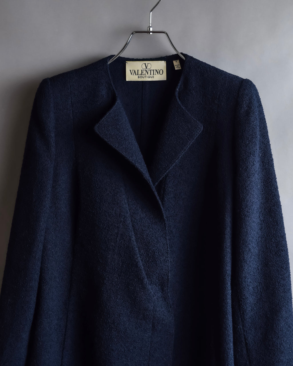 "VALENTINO" Wool boucle concealed front tailored jacket